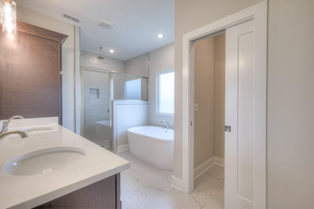 5560 Sinclair Ct, Murfreesboro, TN 37127 - bathroom featuring a marble finish shower, marble look tiles, a freestanding bath, double vanity, and baseboards