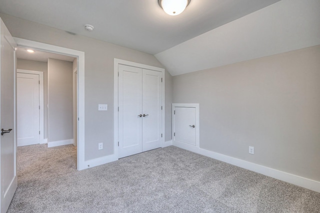 5560 Sinclair Ct, Murfreesboro, TN 37127 - unfurnished bedroom featuring carpet, baseboards, a closet, and lofted ceiling