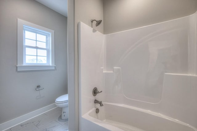 5560 Sinclair Ct, Murfreesboro, TN 37127 - bathroom with toilet, baseboards, bathing tub / shower combination, and marble look tiles