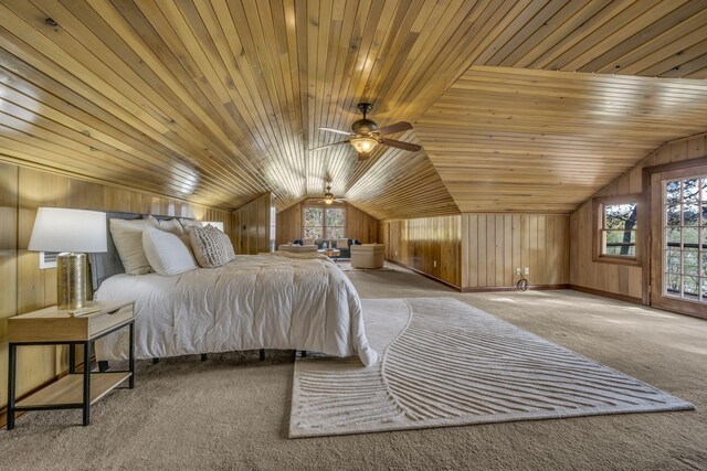 bedroom with wooden ceiling, lofted ceiling, wooden walls, and carpet floors