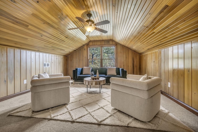 living area featuring wood ceiling, lofted ceiling, carpet, and wooden walls