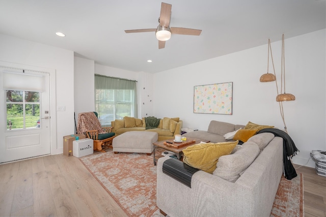 living room with wood finished floors, recessed lighting, and a ceiling fan