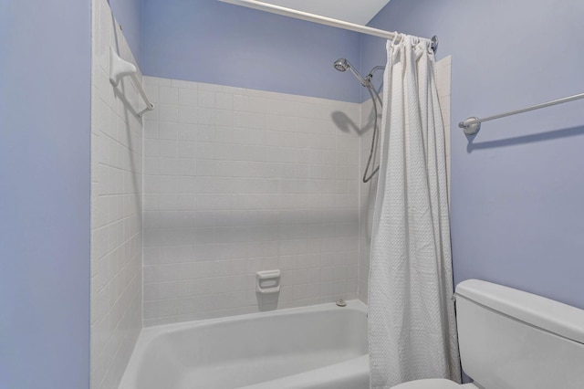 full bathroom with shower / bath combo and toilet