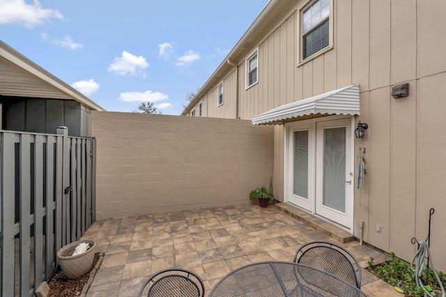 view of patio with a fenced backyard and outdoor dining space