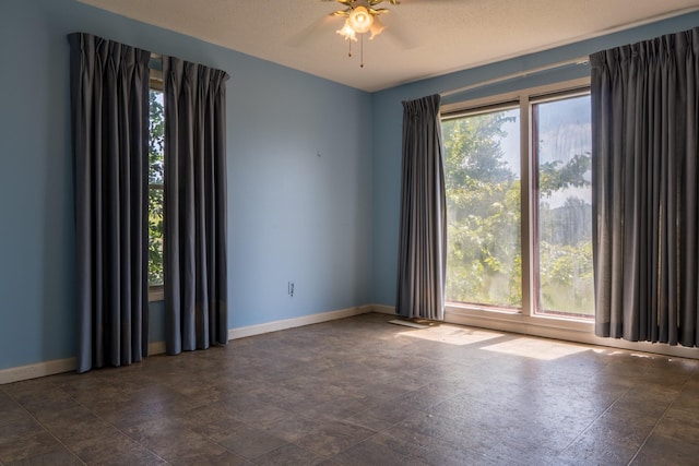 2589 Presley Ridge Rd, Sardis, TN 38371 - spare room with baseboards and ceiling fan