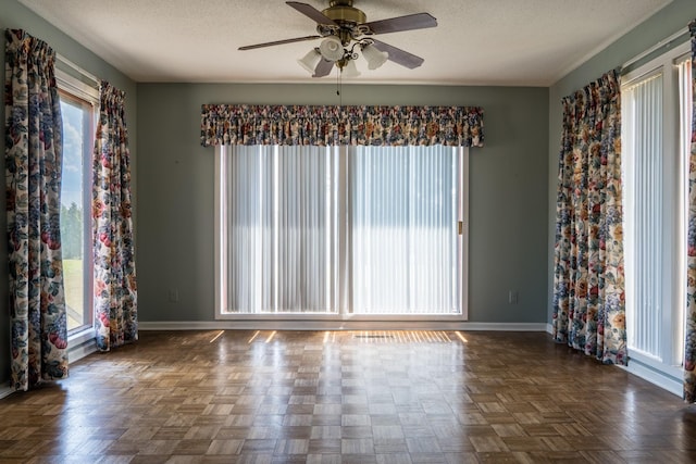 2589 Presley Ridge Rd, Sardis, TN 38371 - unfurnished room featuring a textured ceiling, ceiling fan, and baseboards