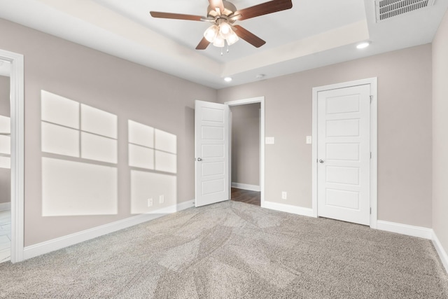 28 Gratton Ests, Clarksville, TN 37043 - unfurnished bedroom with recessed lighting, baseboards, a raised ceiling, carpet floors, and visible vents