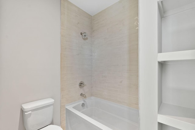bathroom with toilet and  shower combination