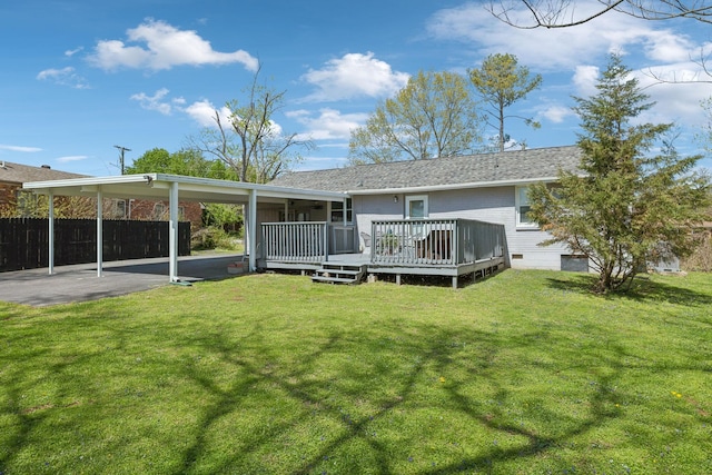 3132 Stafford Dr, Nashville, TN 37214 - rear view of property featuring fence, crawl space, a deck, an attached carport, and a yard