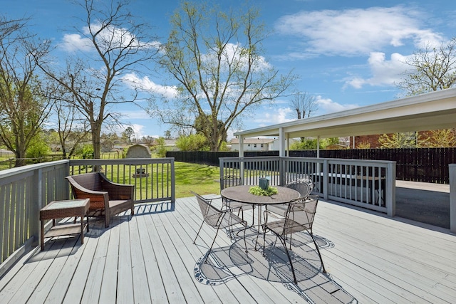 3132 Stafford Dr, Nashville, TN 37214 - wooden terrace featuring a fenced backyard, outdoor dining area, and a yard