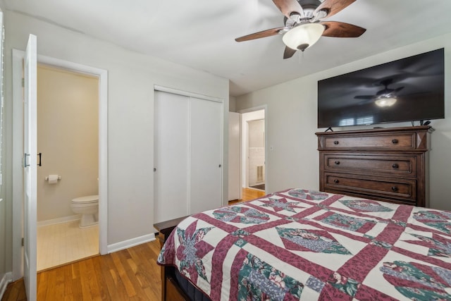 3132 Stafford Dr, Nashville, TN 37214 - bedroom featuring baseboards, light wood-type flooring, a closet, and ensuite bath