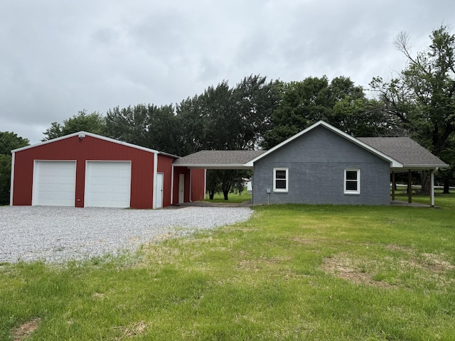 135 Locust Dr, Erin, TN 37061 - ranch-style house featuring an outdoor structure, a front lawn, and a garage