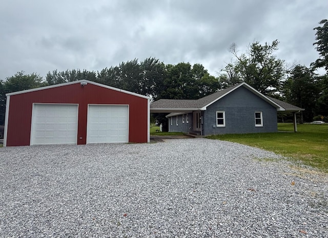 135 Locust Dr, Erin, TN 37061 - view of front facade featuring an outdoor structure and a garage