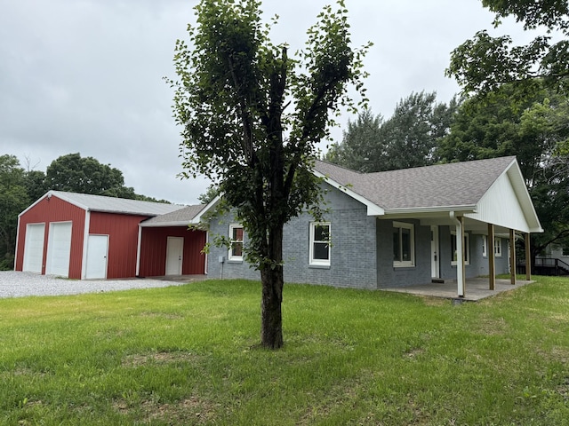 135 Locust Dr, Erin, TN 37061 - ranch-style house featuring a front lawn, covered porch, a garage, and a shingled roof