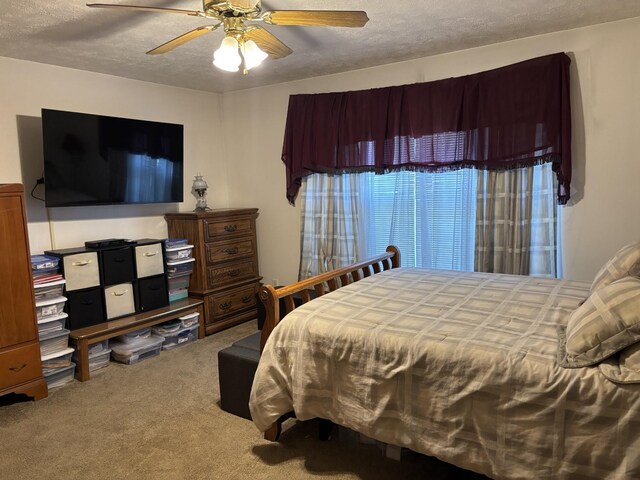 1701 Jamie Dr, Columbia, TN 38401 - bedroom with a ceiling fan, carpet flooring, and a textured ceiling