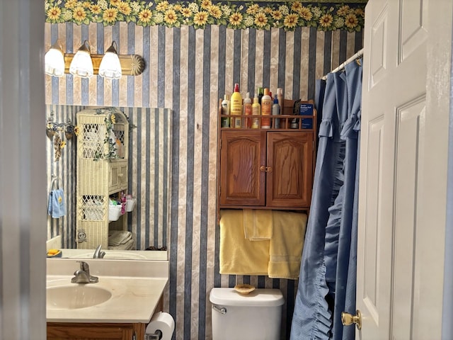 1701 Jamie Dr, Columbia, TN 38401 - bathroom with vanity, wallpapered walls, and toilet