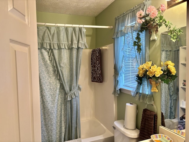 1701 Jamie Dr, Columbia, TN 38401 - full bathroom featuring toilet, a textured ceiling, and shower / tub combo