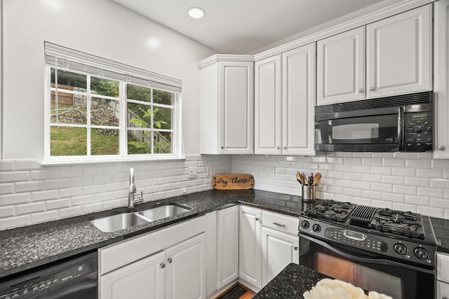 513 Cold Stream Pl, Nashville, TN 37221 - kitchen with a sink, white cabinets, black appliances, and tasteful backsplash