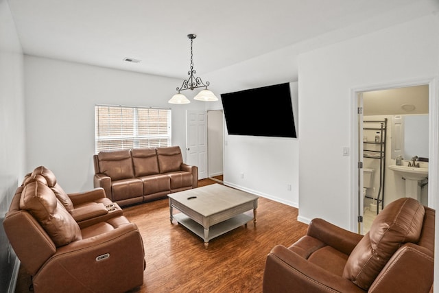 513 Cold Stream Pl, Nashville, TN 37221 - living area featuring wood finished floors, baseboards, and visible vents