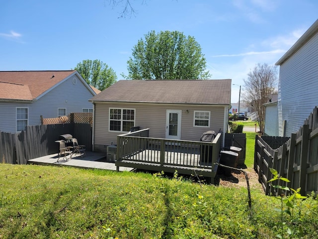 1148 Brittany Park Ln, Antioch, TN 37013 - rear view of house with a lawn, a fenced backyard, and a deck
