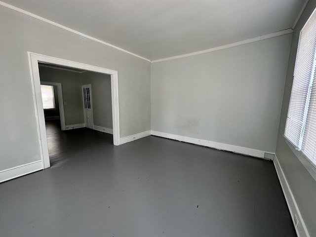 347 E Washington St, Pulaski, TN 38478 - empty room featuring healthy amount of natural light, finished concrete floors, and ornamental molding