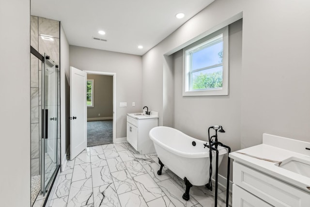 full bathroom with marble finish floor, a sink, a stall shower, visible vents, and two vanities