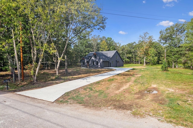 view of front of house featuring an outbuilding and a garage