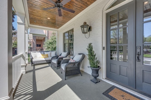 view of patio / terrace featuring a ceiling fan and covered porch