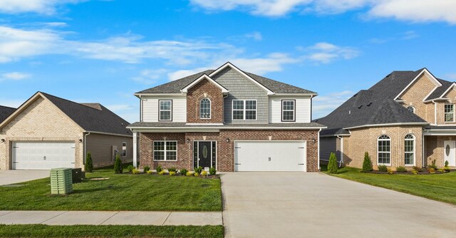 2539 Rafiki Dr, Clarksville, TN 37042 - craftsman house featuring brick siding, a front lawn, and concrete driveway