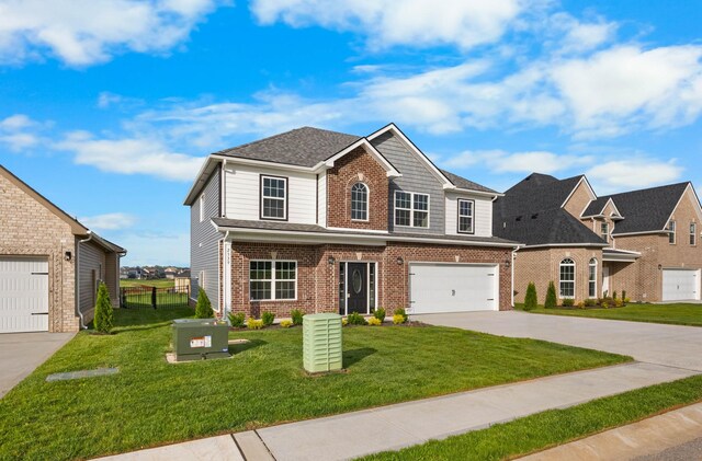 2539 Rafiki Dr, Clarksville, TN 37042 - traditional-style home featuring brick siding, driveway, and an attached garage