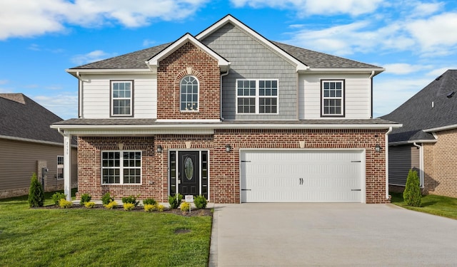 2539 Rafiki Dr, Clarksville, TN 37042 - view of front facade with concrete driveway, a front yard, brick siding, an attached garage, and roof with shingles