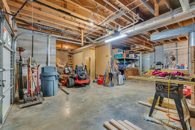 unfinished basement with concrete block wall