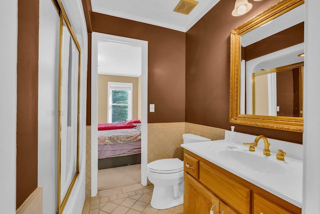 full bath with tile walls, a shower with door, toilet, visible vents, and tile patterned flooring