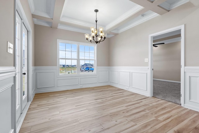 2531 Rafiki Dr, Clarksville, TN 37042 - spare room featuring crown molding, light wood finished floors, beam ceiling, an inviting chandelier, and coffered ceiling