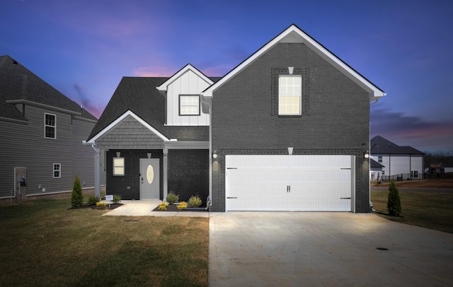 2531 Rafiki Dr, Clarksville, TN 37042 - traditional home featuring an attached garage, board and batten siding, driveway, brick siding, and a yard