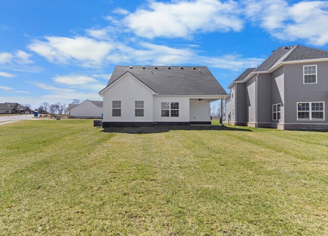 2531 Rafiki Dr, Clarksville, TN 37042 - back of property with central AC unit, a lawn, and ceiling fan