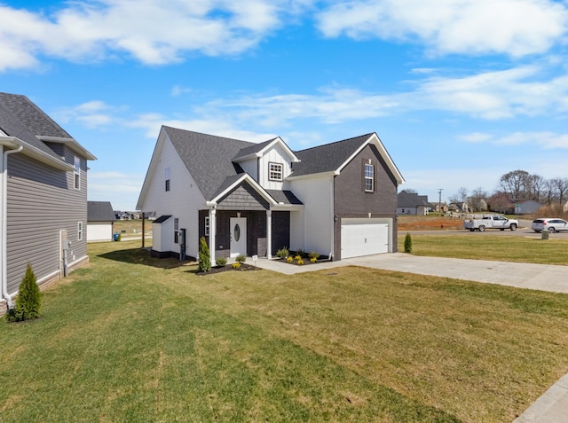2531 Rafiki Dr, Clarksville, TN 37042 - view of front of house featuring driveway, a garage, a front lawn, and board and batten siding