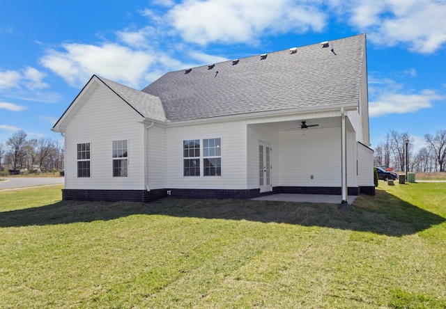 2531 Rafiki Dr, Clarksville, TN 37042 - rear view of house with a ceiling fan, a lawn, a shingled roof, and a patio