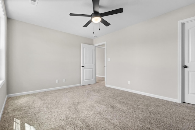 2531 Rafiki Dr, Clarksville, TN 37042 - unfurnished bedroom featuring carpet floors, baseboards, ceiling fan, and visible vents