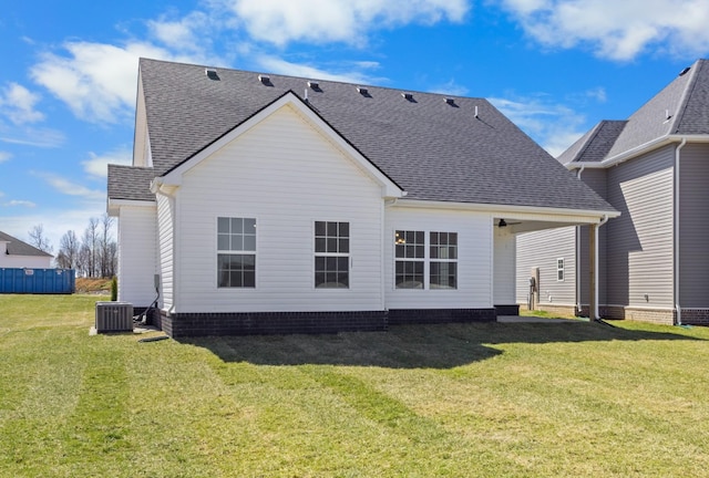 2531 Rafiki Dr, Clarksville, TN 37042 - rear view of property featuring a lawn, cooling unit, and roof with shingles