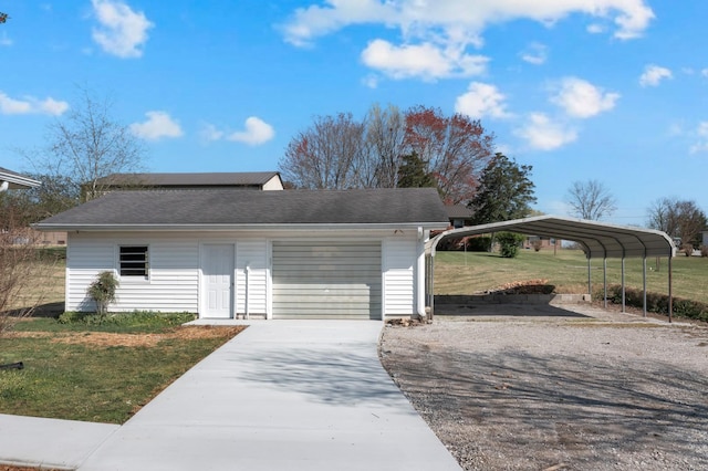 garage featuring concrete driveway