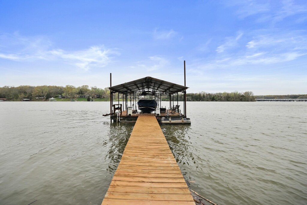 2041 Sanford Dr, Mount Juliet, TN 37122 - view of dock featuring boat lift and a water view