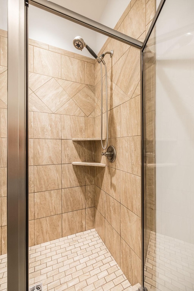 full bathroom featuring a shower stall