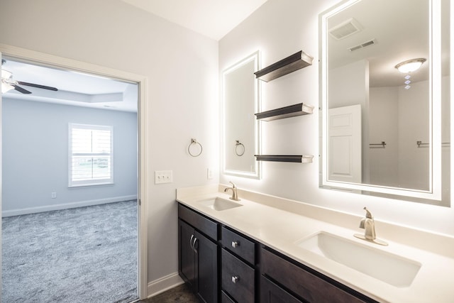 full bath featuring a ceiling fan, a sink, and visible vents