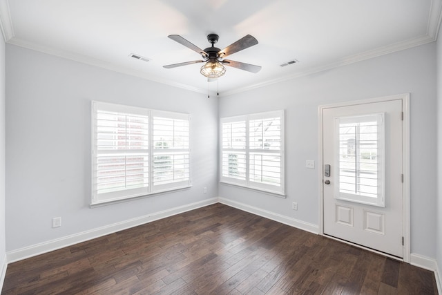 entryway featuring a ceiling fan, dark wood finished floors, ornamental molding, and visible vents