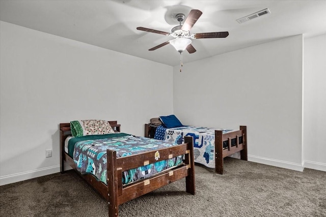 bedroom with baseboards, visible vents, and carpet flooring