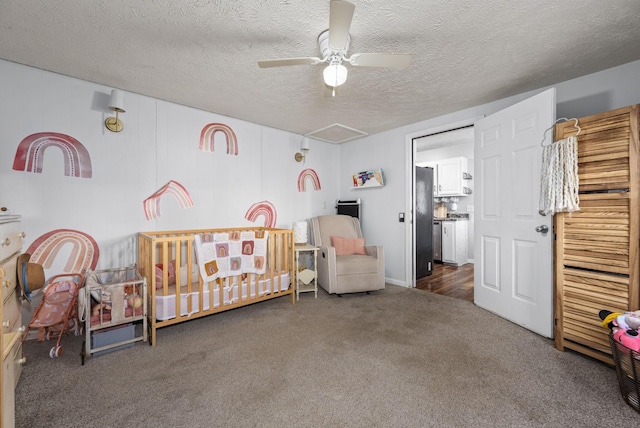 carpeted bedroom with a textured ceiling, a ceiling fan, and freestanding refrigerator
