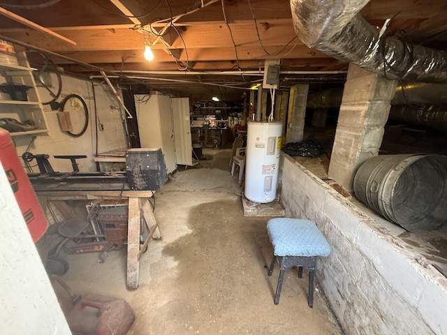 unfinished basement featuring water heater