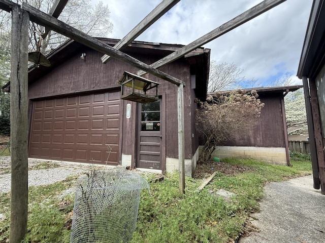exterior space featuring a garage