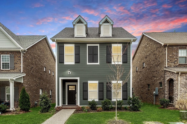 view of front facade featuring a front yard